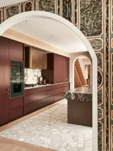 Custom Palladiana stone flooring in a luxury residential kitchen featuring bespoke joinery and natural stone benchtops.