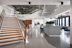 Commercial insitu terrazzo flooring and architectural staircase within the CBUS Super Melbourne headquarters.